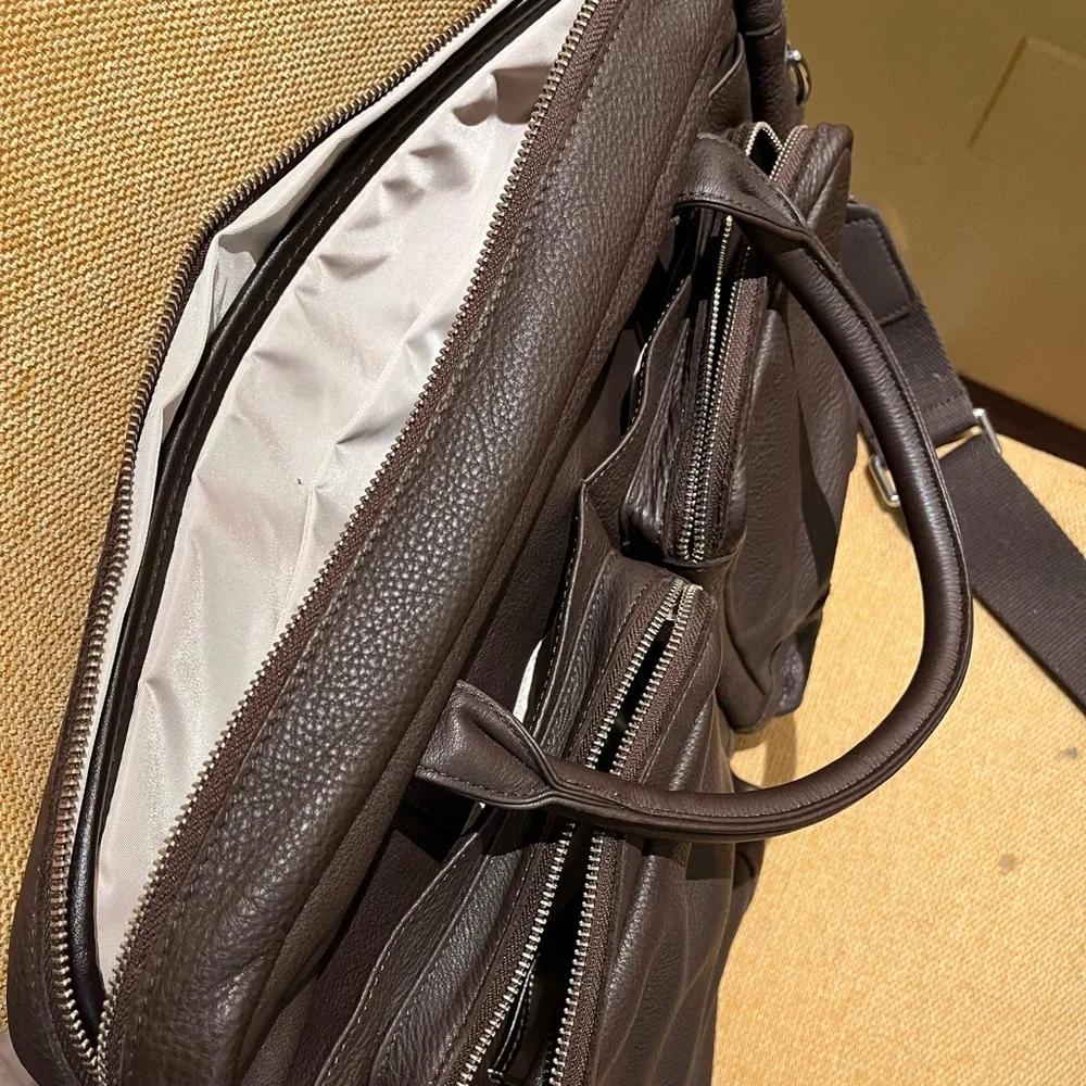 New unused Peter Millar Dark Brown Pebbled Leather Briefcase & Removable Strap.